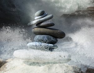 zen stones by stormy water